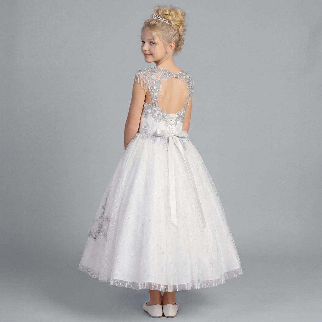 Back view of white girls formal gown with oval open back, silver embroidery and white satin bow
