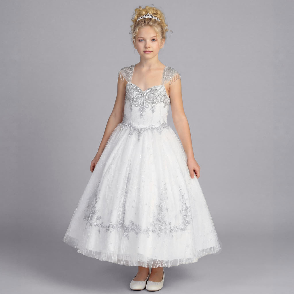 Front view of girls white formal dress with silver embroidered bodice, beaded shoulder fringe and sparkling tulle skirt